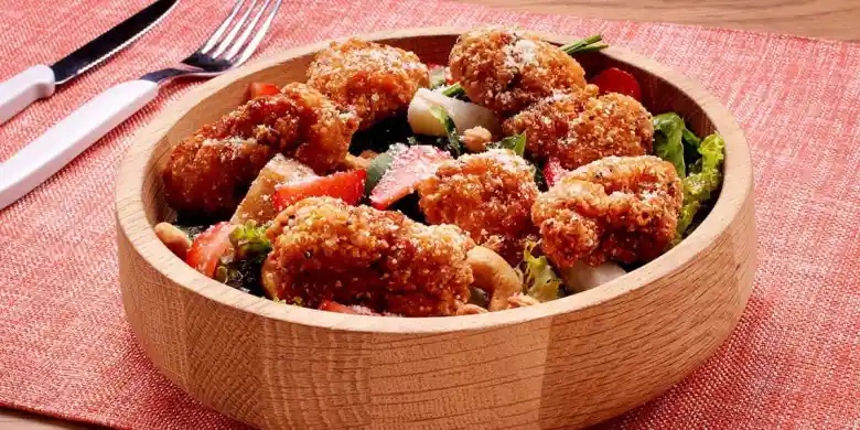 Receta Boneless artisanos con ensalada de frutos rojos